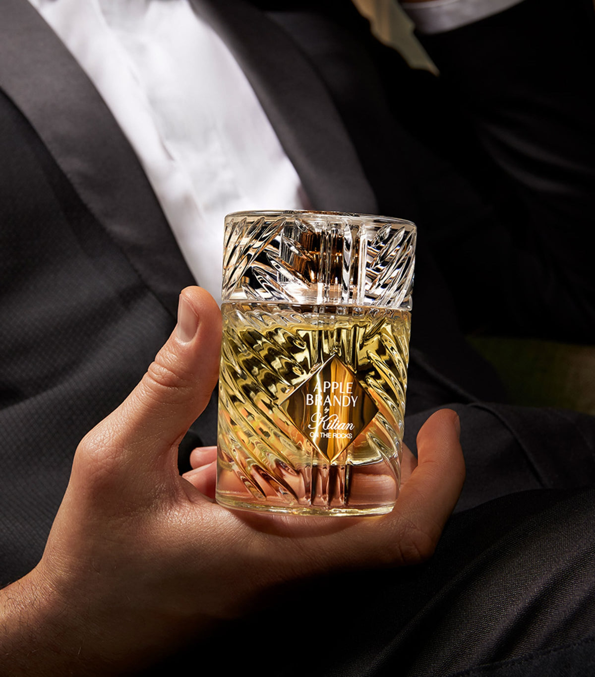 Kilian Apple Brandy On the Rocks Eau de Parfum 100ml - campaign mood shot of the bottle