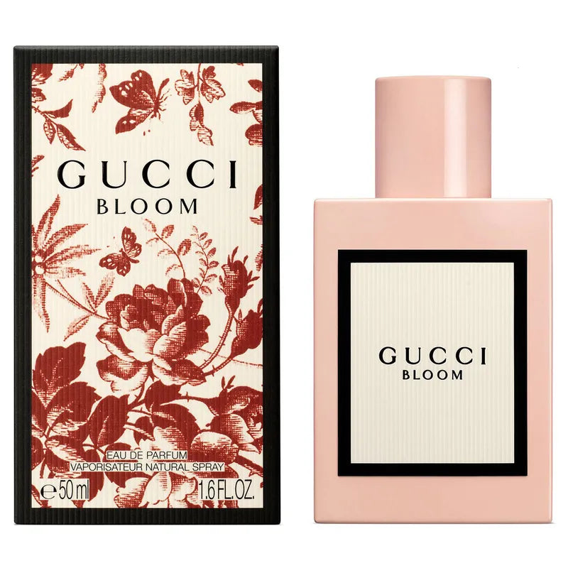 Gucci Bloom perfume bottle and packaging with floral design