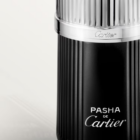 Cartier Pasha de Cartier black and silver bottle on a white background