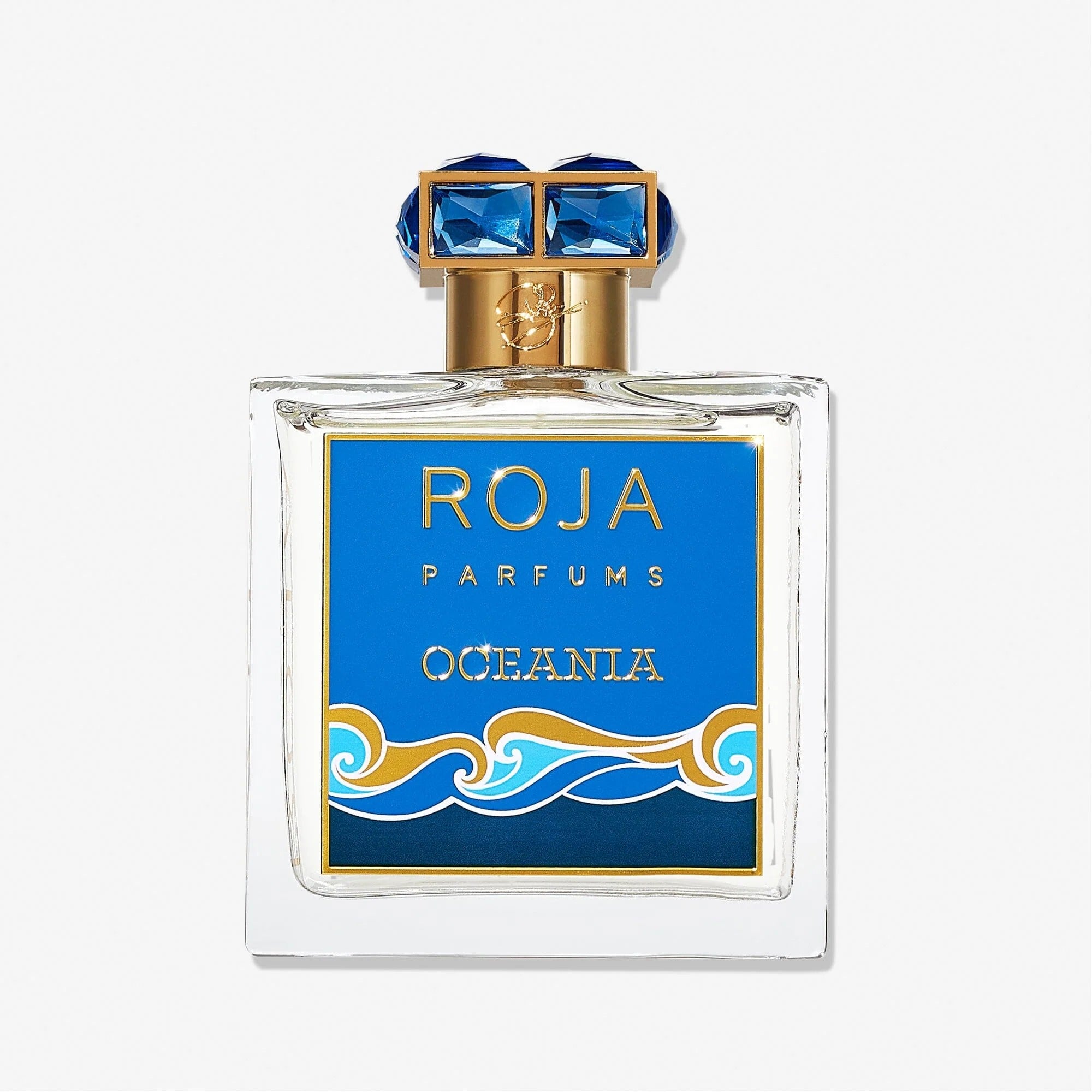 Roja Parfums Ochania perfume bottle with blue and gold design on a white background